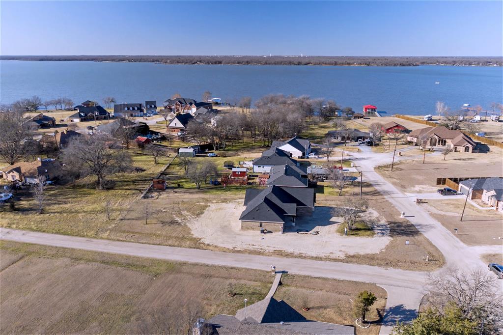 44 Karol Jean Way Quinlan, TX 75474 - Photo 2 of 36 Aerial perspective of suburban area with a large body of water