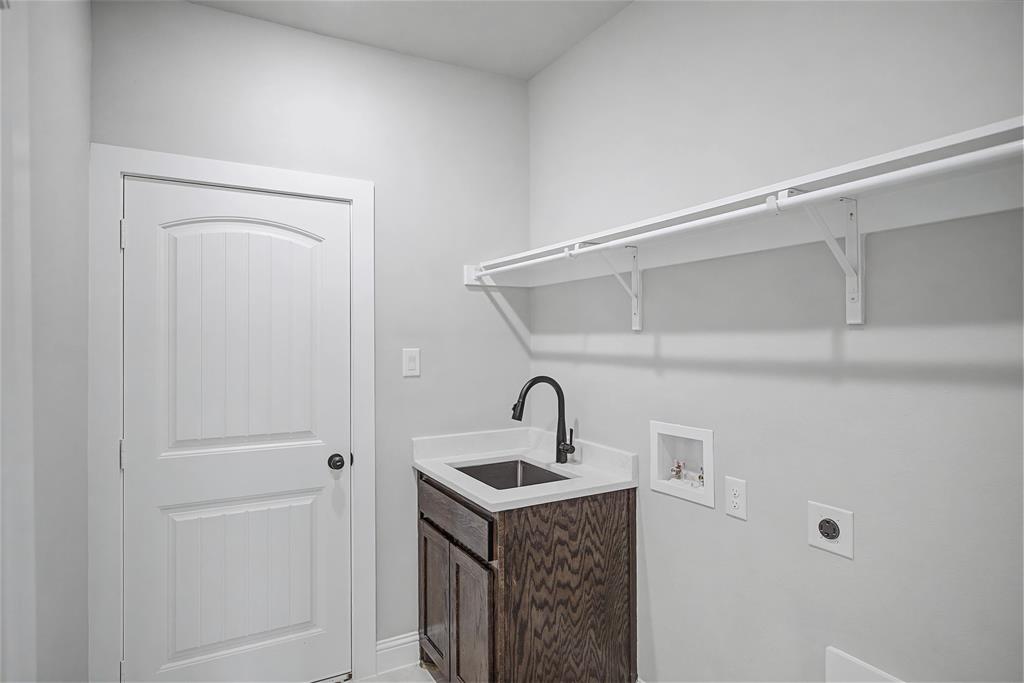 44 Karol Jean Way Quinlan, TX 75474 - Photo 30 of 36 Laundry room with electric dryer hookup, washer hookup, and cabinet space