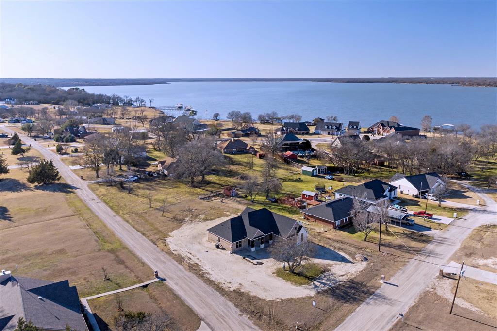 44 Karol Jean Way Quinlan, TX 75474 - Photo 32 of 36 Aerial view of residential area with a nearby body of water