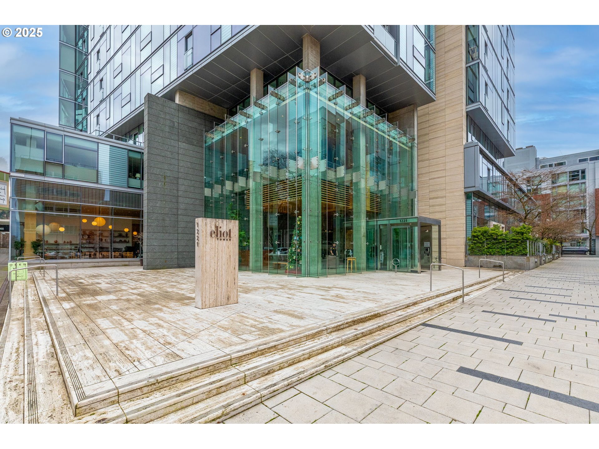 a view of a building with a street