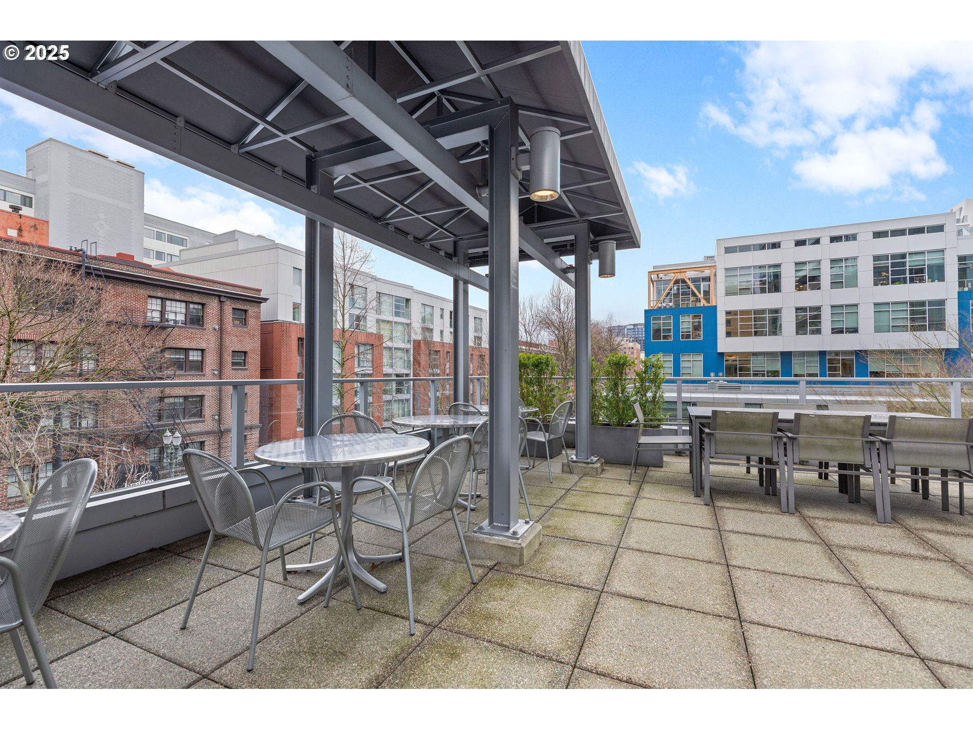 1221 Southwest 10th Avenue, Unit 809 Portland, OR 97205 - Photo 21 of 39 a view of a patio with table and chairs