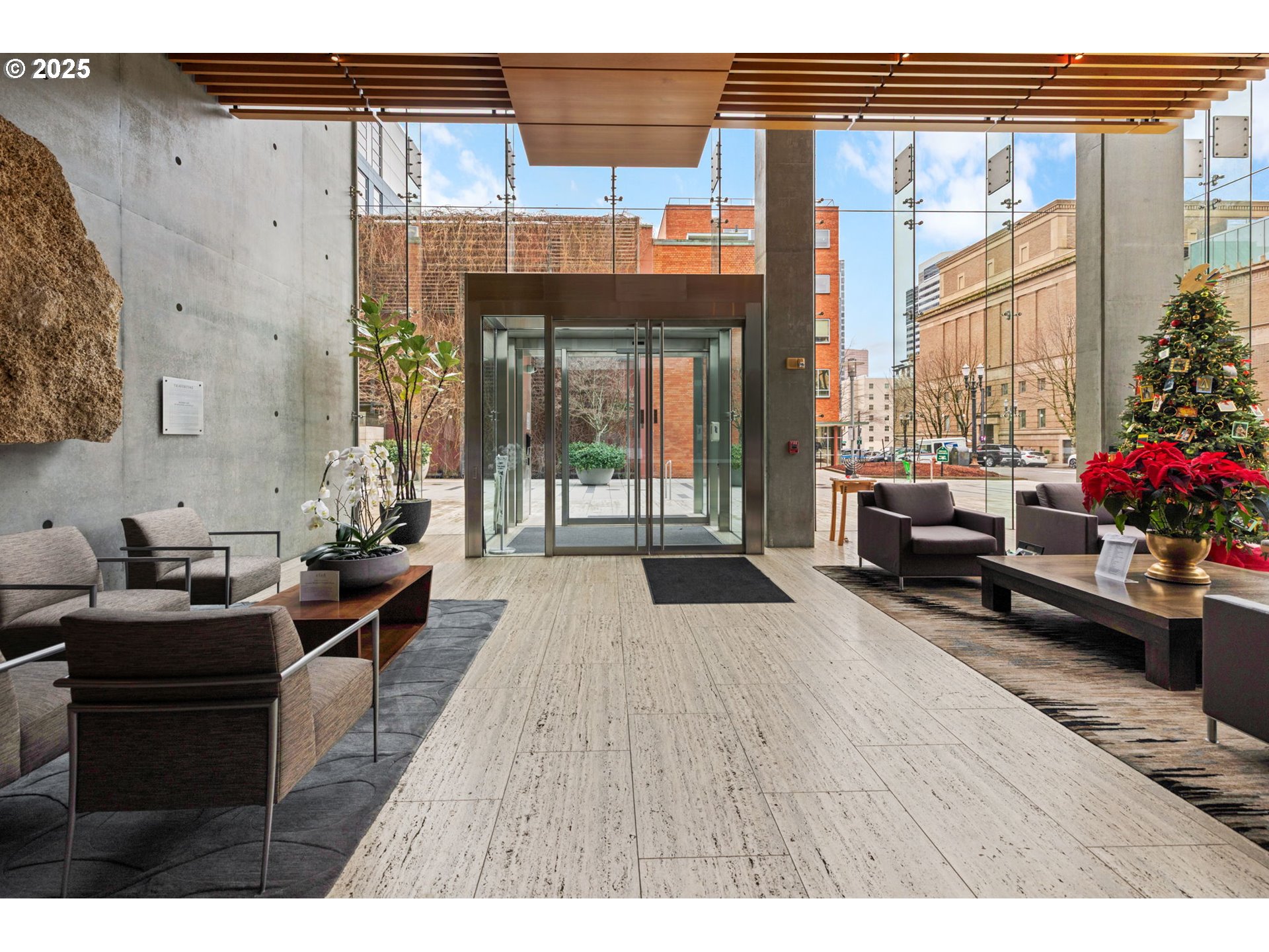 1221 Southwest 10th Avenue, Unit 809 Portland, OR 97205 - Photo 27 of 39 a living room with furniture window and wooden floor
