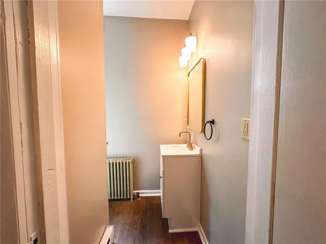 a bathroom with a toilet and a sink