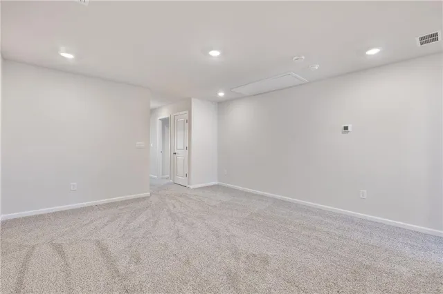 a view of a kitchen with furniture and a projector