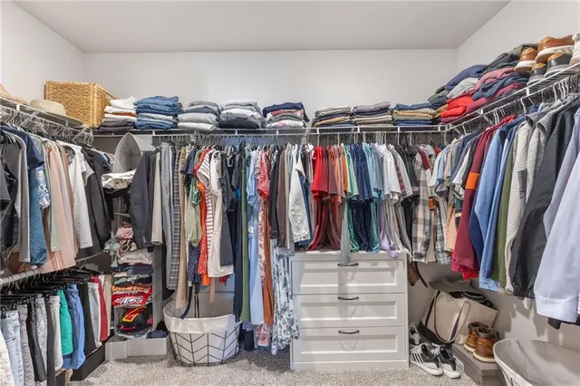 a bathroom with a sink toilet and mirror