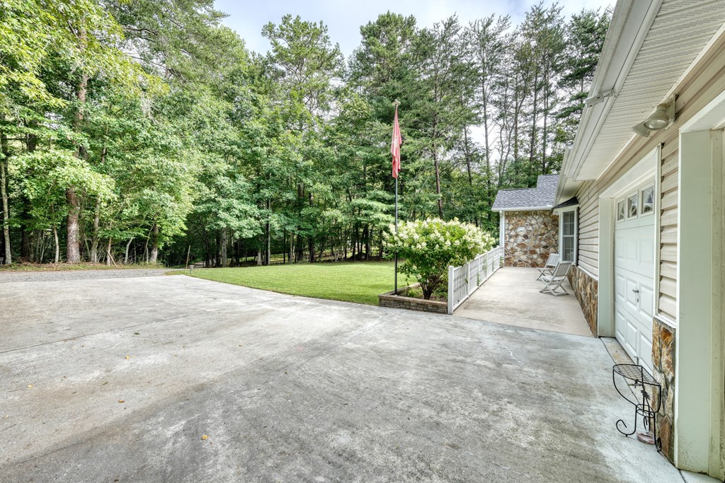 79 Mashie Lane Murphy, NC 28906 - Photo 15 of 76 a view of a yard with plants and trees
