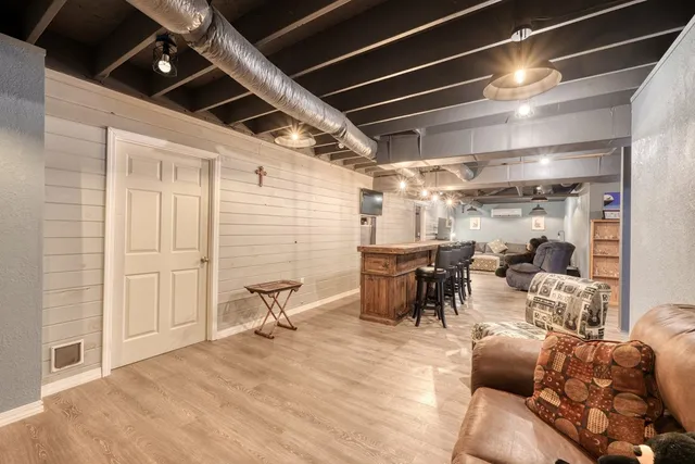 an aerial view of residential house with outdoor space and river