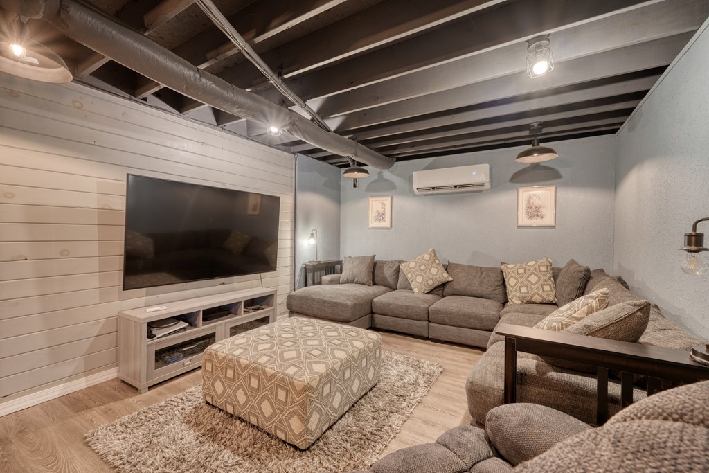 79 Mashie Lane Murphy, NC 28906 - Photo 52 of 76 a living room with furniture and a flat screen tv