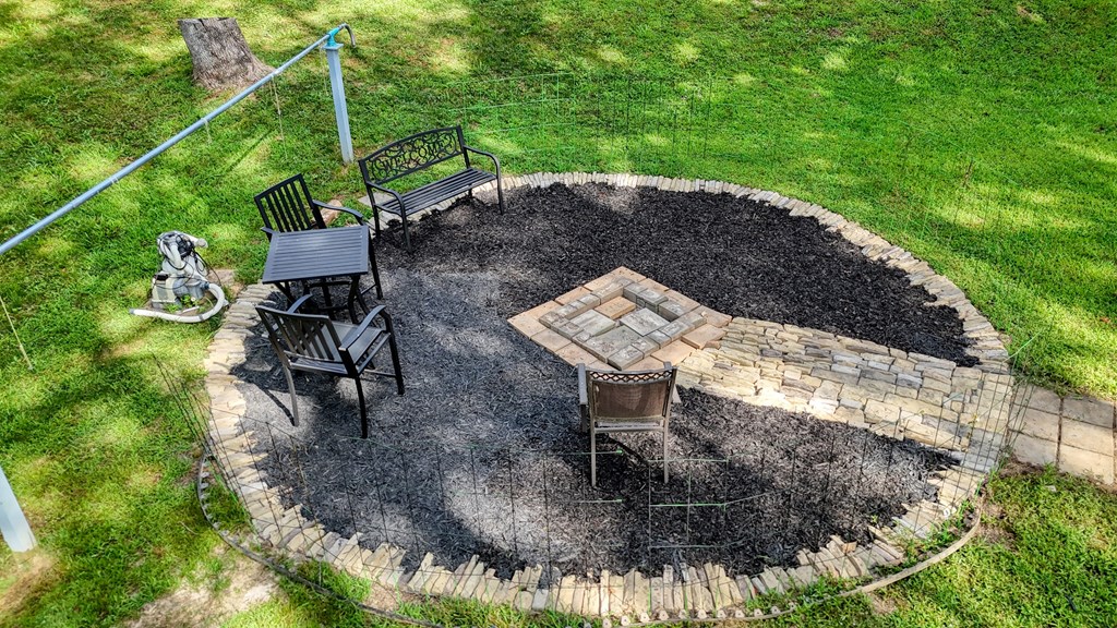 79 Mashie Lane Murphy, NC 28906 - Photo 71 of 76 a view of a chairs and table in the backyard
