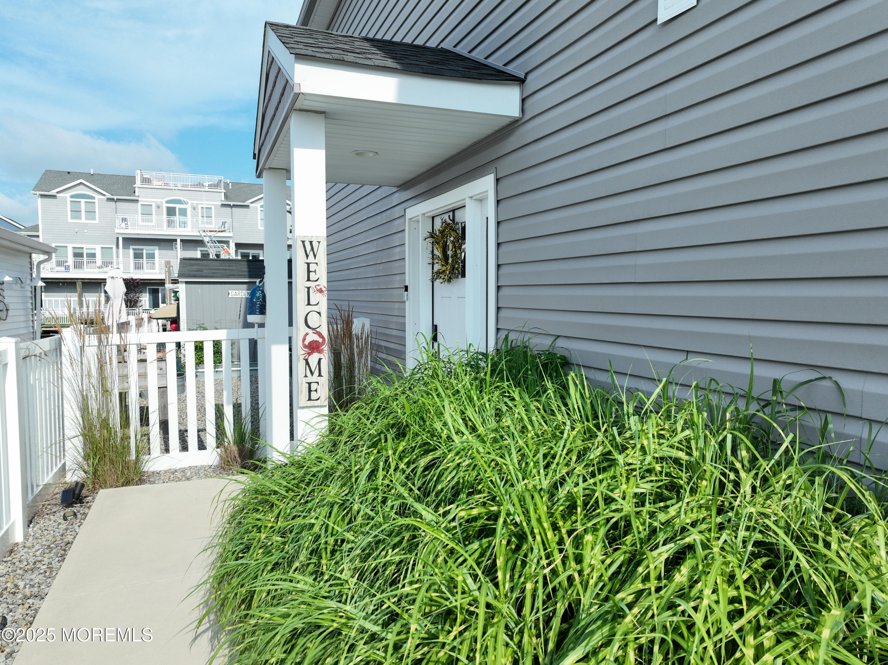 5 Sands Point Road Waretown, NJ 08758 - Photo 4 of 64 a house view with a garden space
