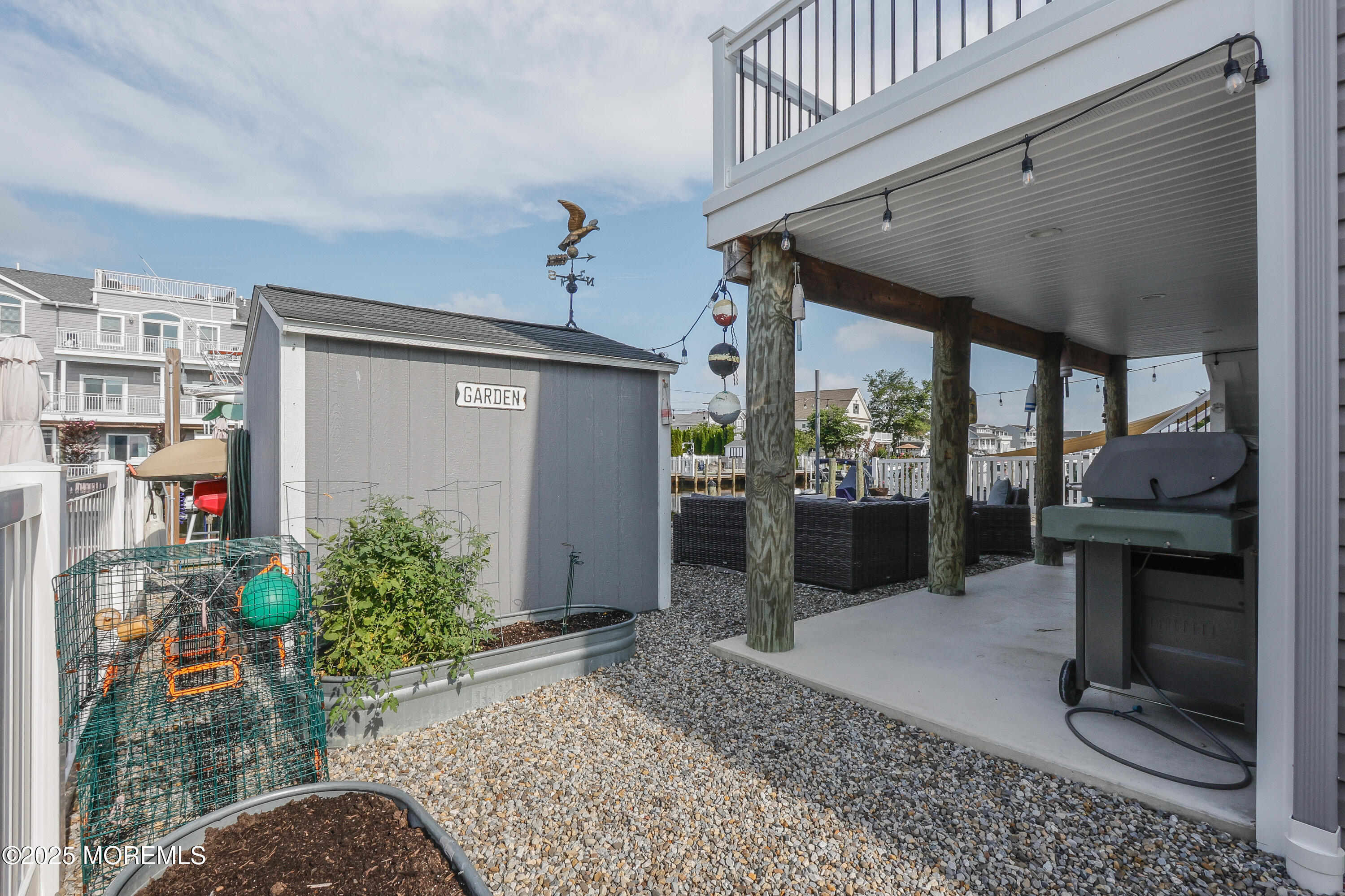 5 Sands Point Road Waretown, NJ 08758 - Photo 60 of 64 a view of a porch with furniture