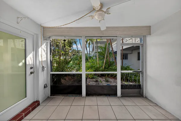 a view of an entryway with a glass door
