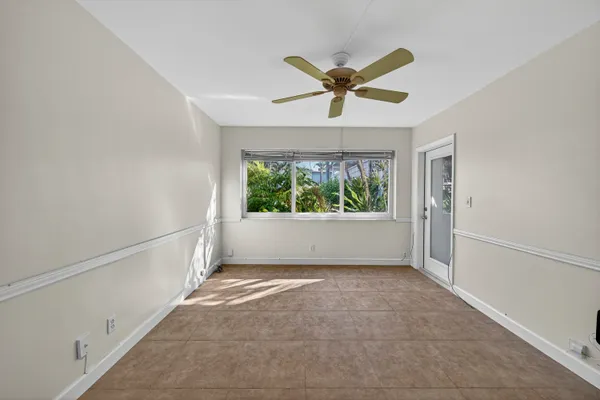 a view of an empty room and window