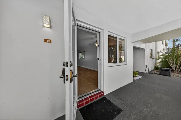 a view of a hallway with workspace