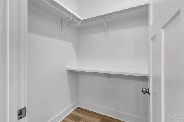 a view of an empty walk in closet
