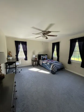 a room with gym equipment and a window