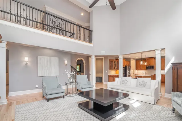 a living room with furniture and a table