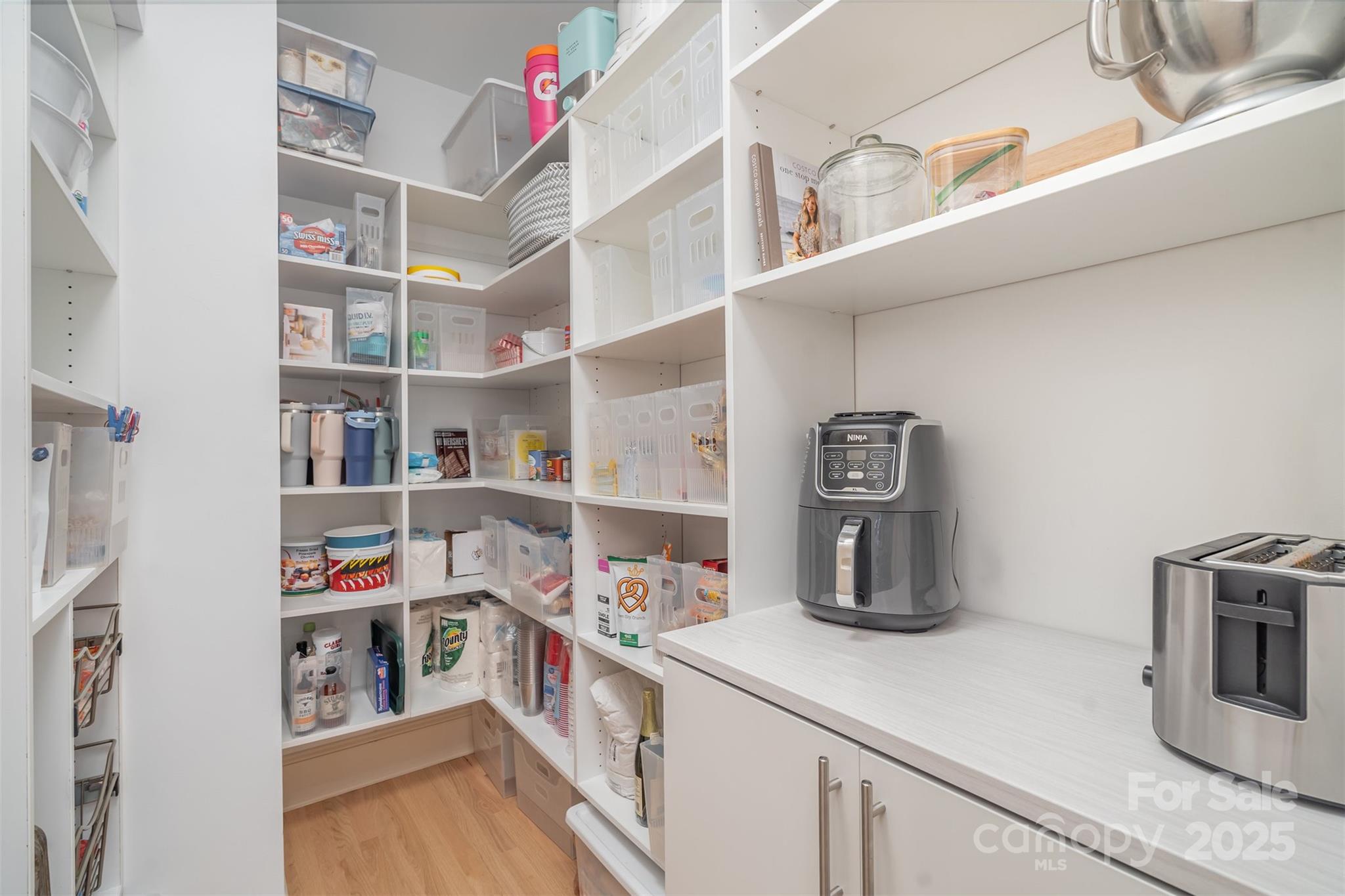 9021 Unbridle Lane Waxhaw, NC 28173 - Photo 16 of 48 a kitchen with a fridge and cabinets