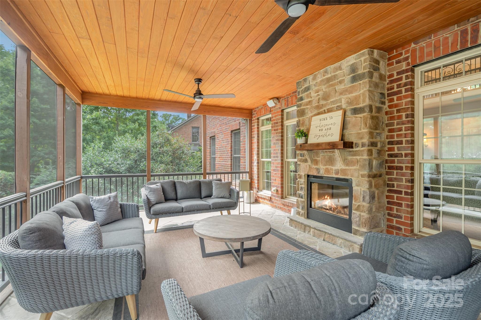 9021 Unbridle Lane Waxhaw, NC 28173 - Photo 18 of 48 a outdoor space with patio furniture and a fireplace