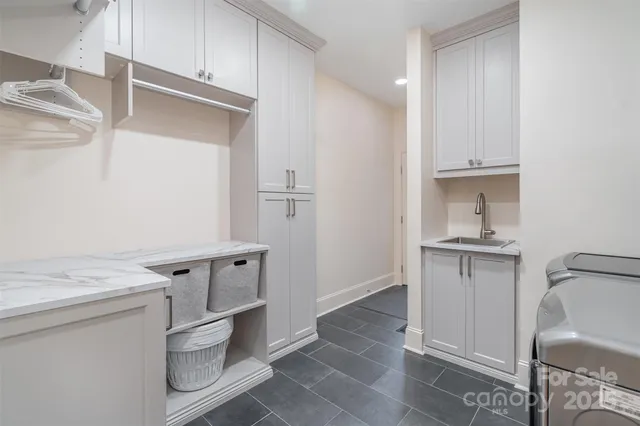 a hallway with washer and dryer