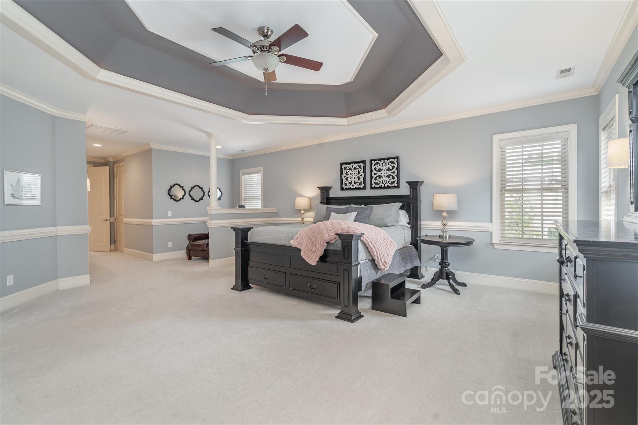 9021 Unbridle Lane Waxhaw, NC 28173 - Photo 22 of 48 a bedroom with furniture and a large window