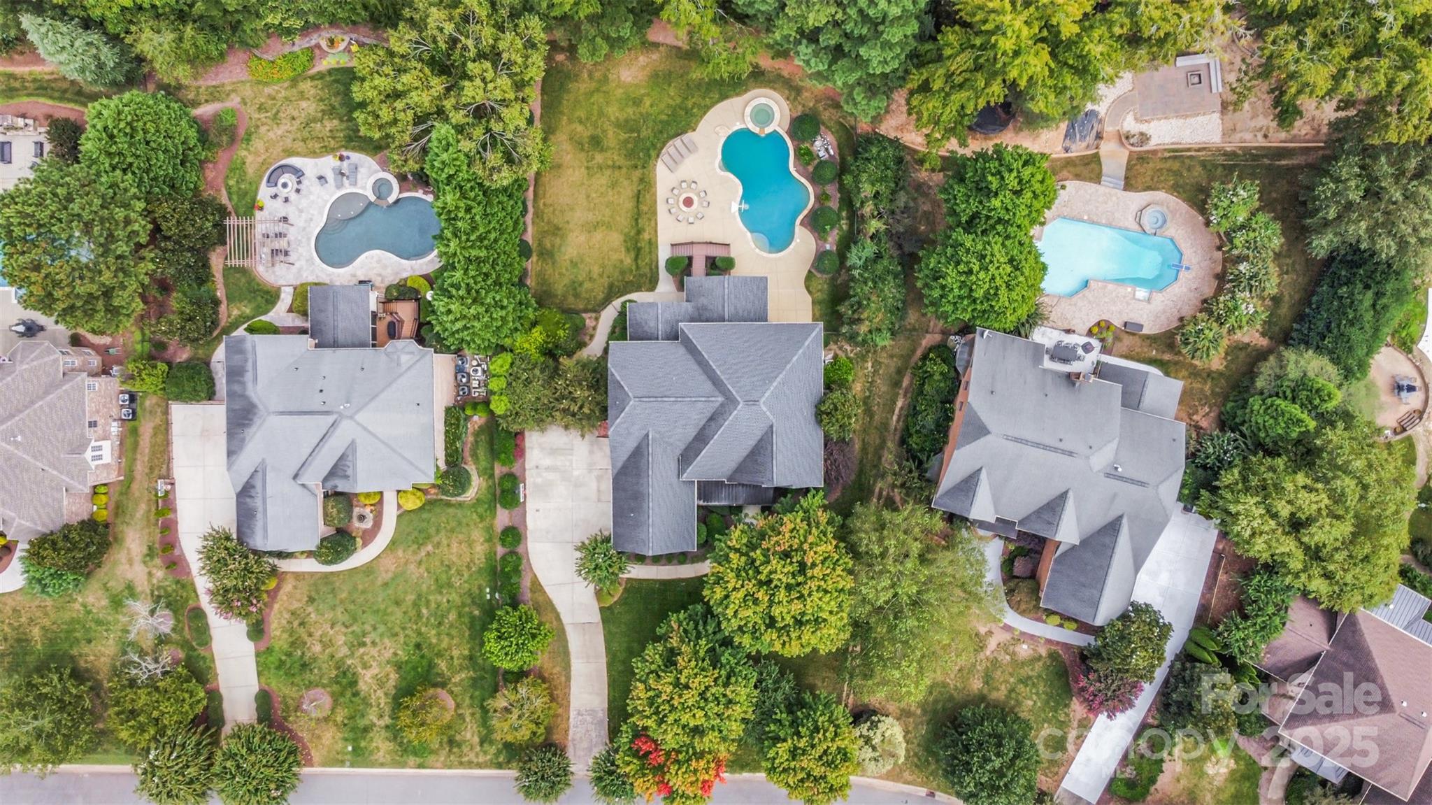 9021 Unbridle Lane Waxhaw, NC 28173 - Photo 48 of 48 an aerial view of a house with a yard and a large tree