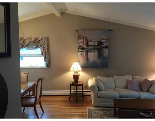 28 Peterson Road Natick, MA 01760 - Photo 17 of 30 a living room with furniture and a lamp