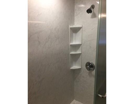 28 Peterson Road Natick, MA 01760 - Photo 20 of 30 a bathroom with a shower