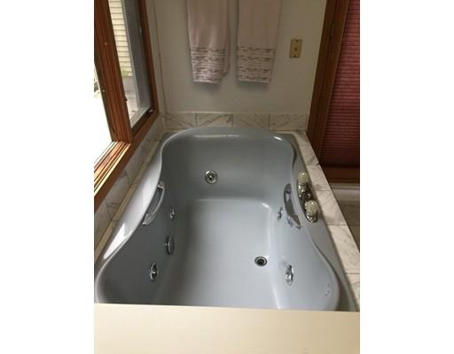 28 Peterson Road Natick, MA 01760 - Photo 22 of 30 a bathroom with mirror sink and window