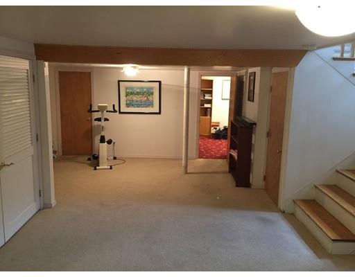 28 Peterson Road Natick, MA 01760 - Photo 25 of 30 a view of a livingroom with furniture and a hallway