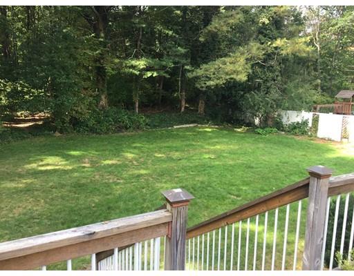 28 Peterson Road Natick, MA 01760 - Photo 7 of 30 a view of a backyard with a garden