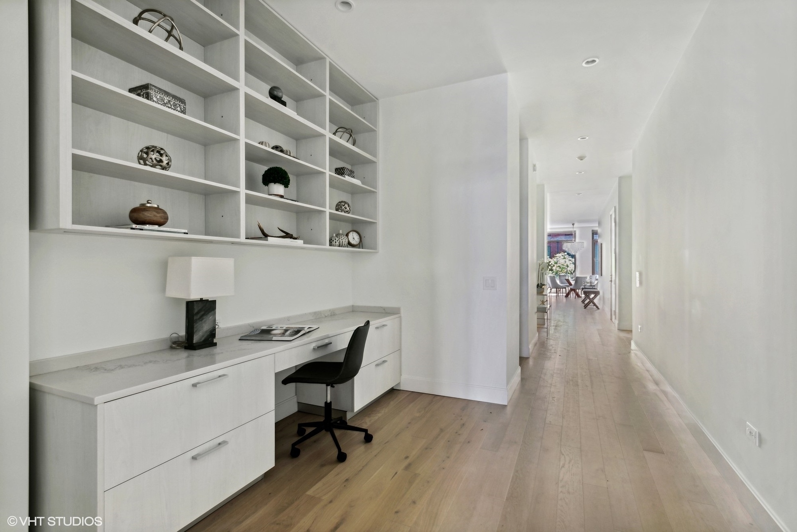 36 North Carpenter Street, Unit 2N Chicago, IL 60607 - Photo 13 of 25 a view of a workspace with furniture and wooden floor