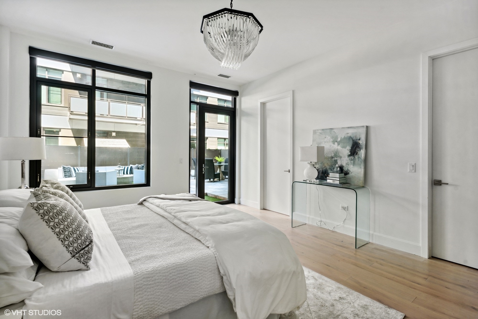 36 North Carpenter Street, Unit 2N Chicago, IL 60607 - Photo 20 of 25 a bedroom with bed and a window