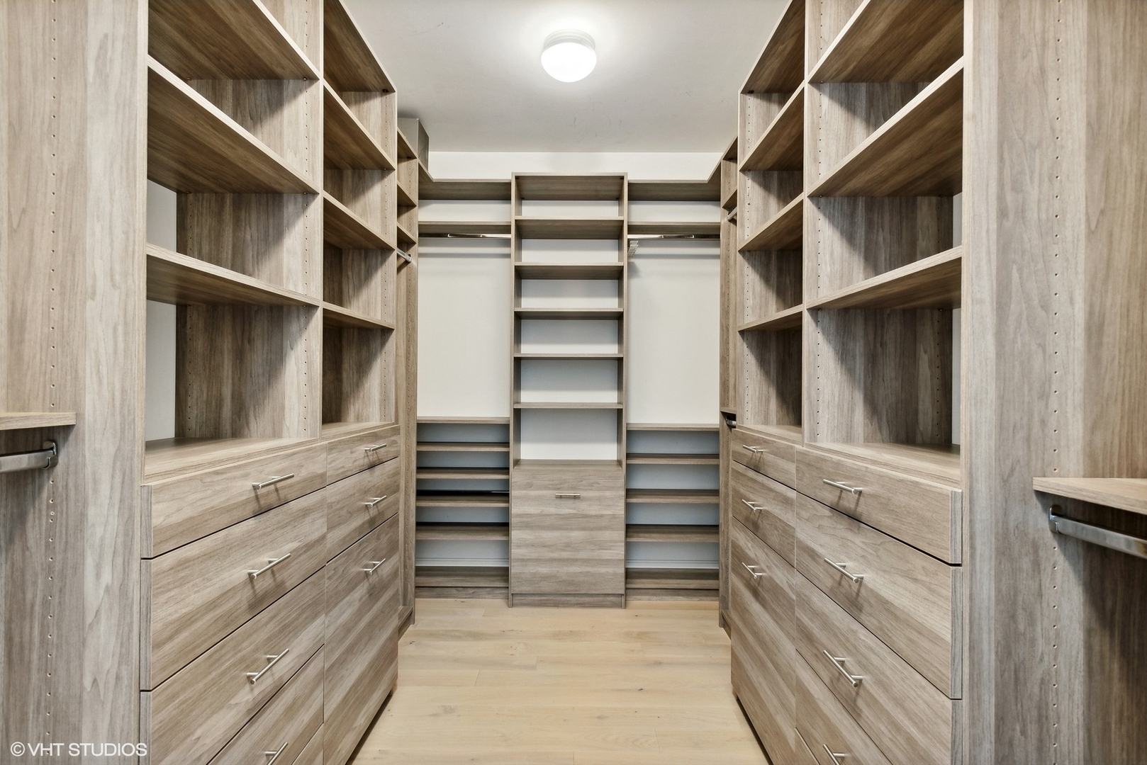 36 North Carpenter Street, Unit 2N Chicago, IL 60607 - Photo 23 of 25 a view of walk in closet with empty racks