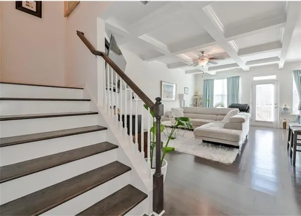 a view of entryway and hall with dining room