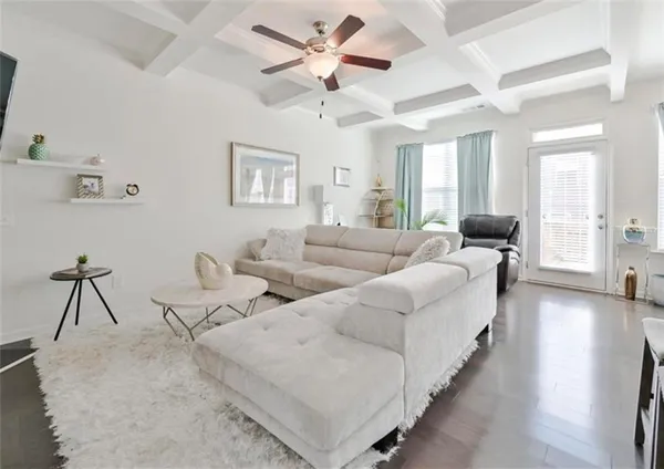 a living room with furniture and window