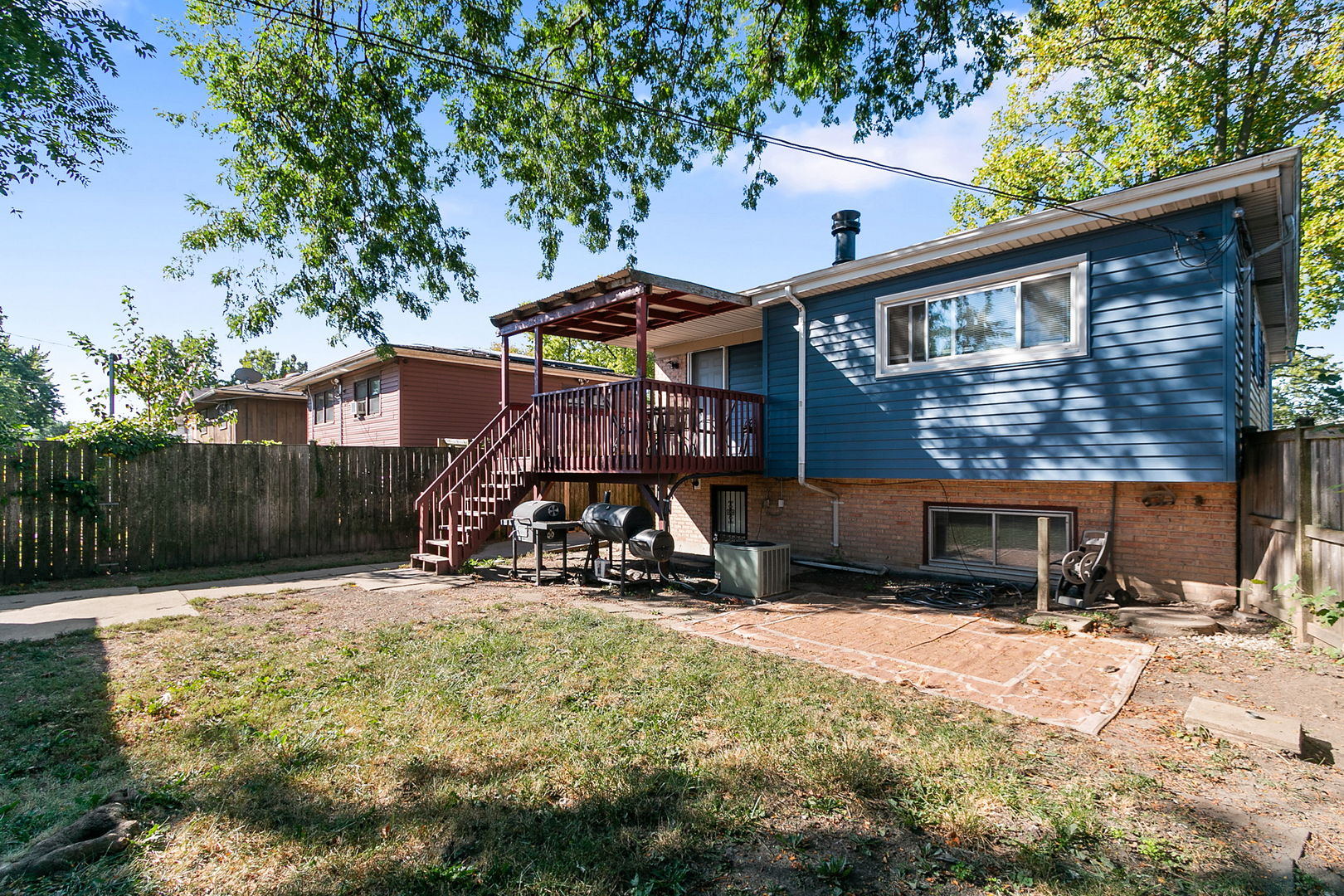 15221 Oak Street Dolton, IL 60419 - Photo 16 of 16 a view of a house with yard and sitting area