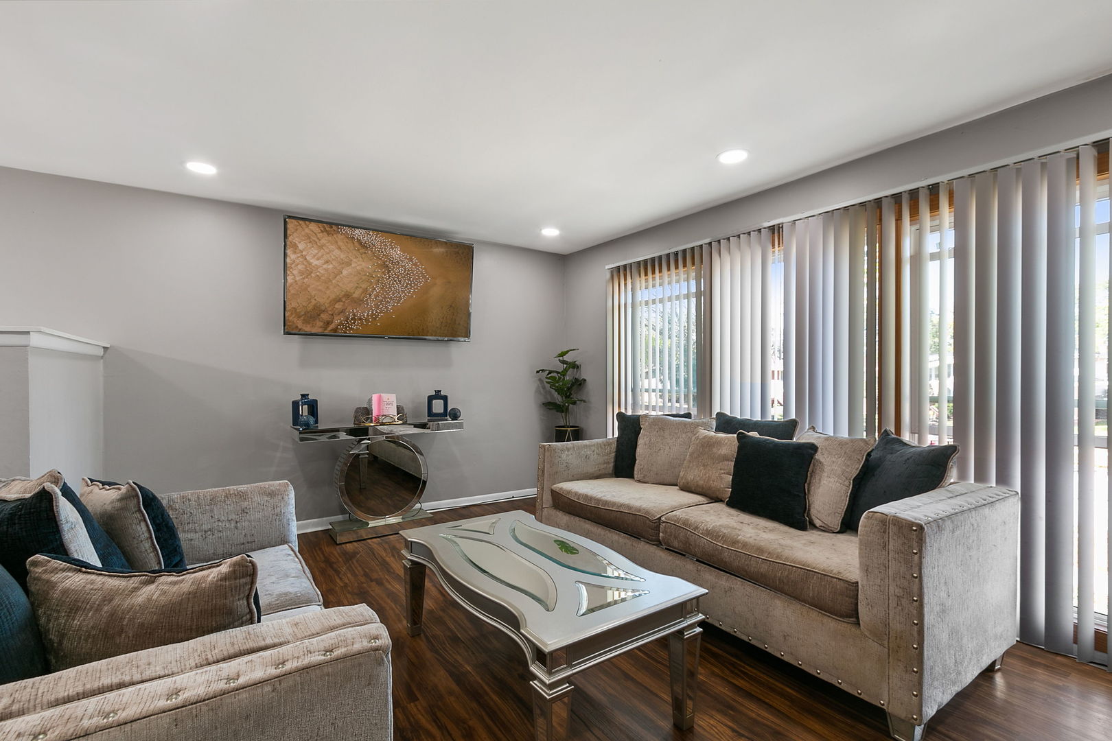 15221 Oak Street Dolton, IL 60419 - Photo 3 of 16 a living room with furniture and a flat screen tv