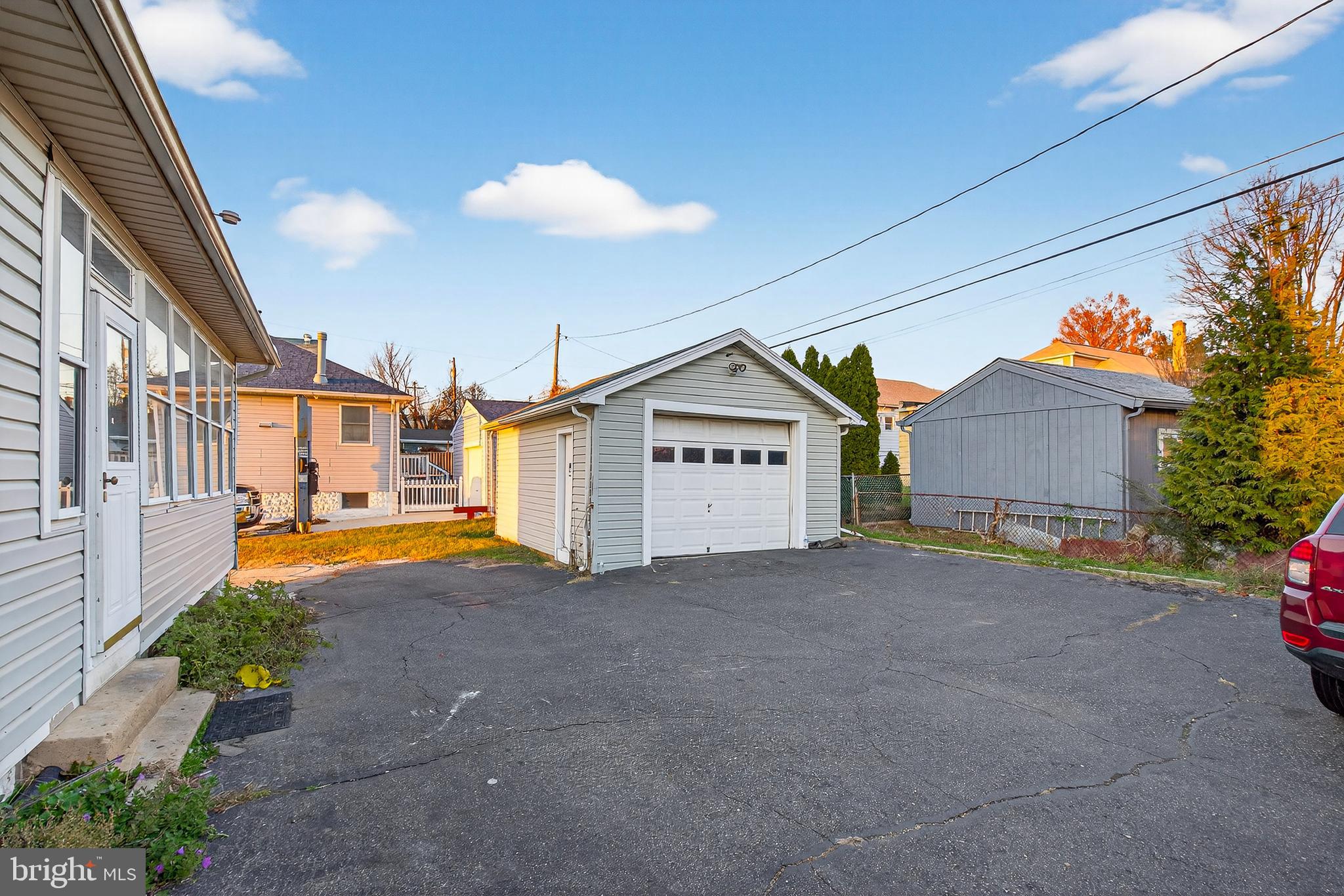 511 47th Street Baltimore, MD 21224 - Photo 12 of 44 a view of the house with backyard and garden