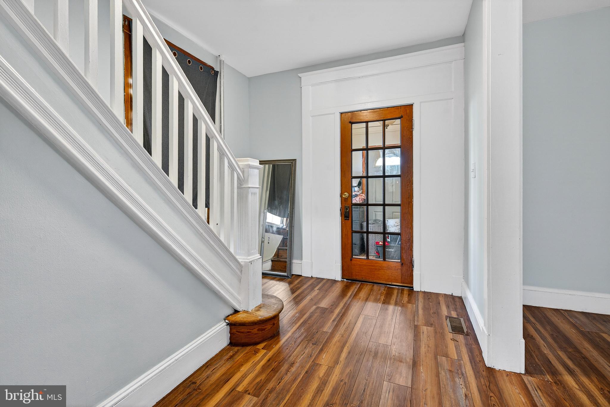 511 47th Street Baltimore, MD 21224 - Photo 23 of 44 a view of an entryway with wooden floor