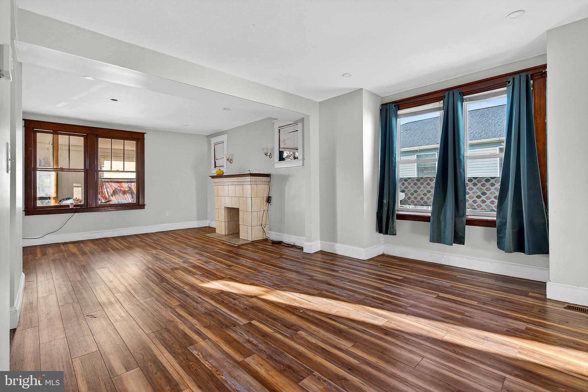 511 47th Street Baltimore, MD 21224 - Photo 24 of 44 a view of empty room with wooden floor and fan