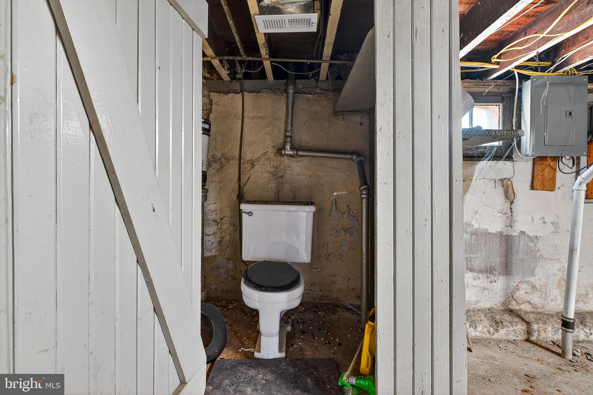 511 47th Street Baltimore, MD 21224 - Photo 33 of 44 a bathroom with a sink and toilet