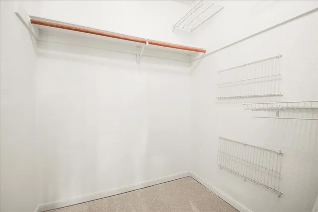 a view of small space with racks on the wall