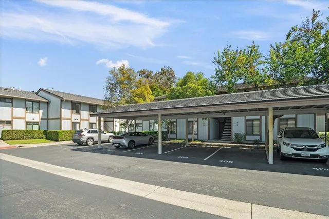 a building with trees in front of it