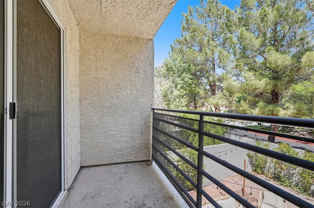 6250 West Flamingo Road, Unit 93 Las Vegas, NV 89103 - Photo 32 of 38 Enjoy outdoor living with this inviting patio space, perfect for relaxation and fresh air.
