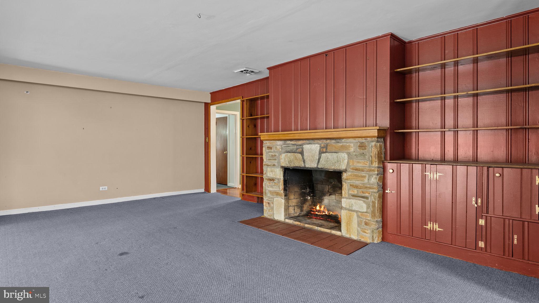 69 Crooked Billet Road Hatboro, PA 19040 - Photo 13 of 33 a view of a livingroom with an empty space and a fireplace