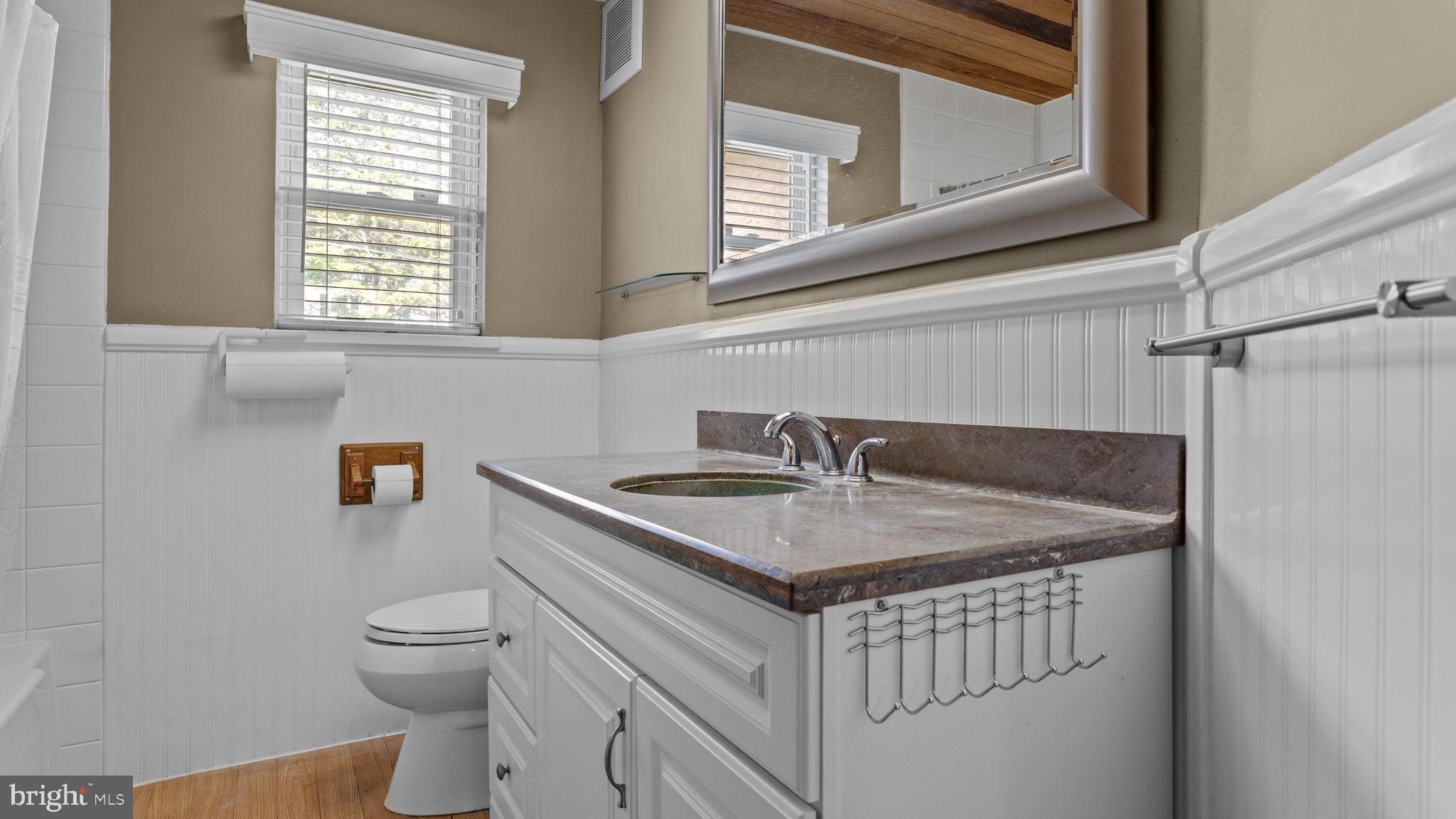 69 Crooked Billet Road Hatboro, PA 19040 - Photo 22 of 33 a bathroom with a sink toilet vanity and window