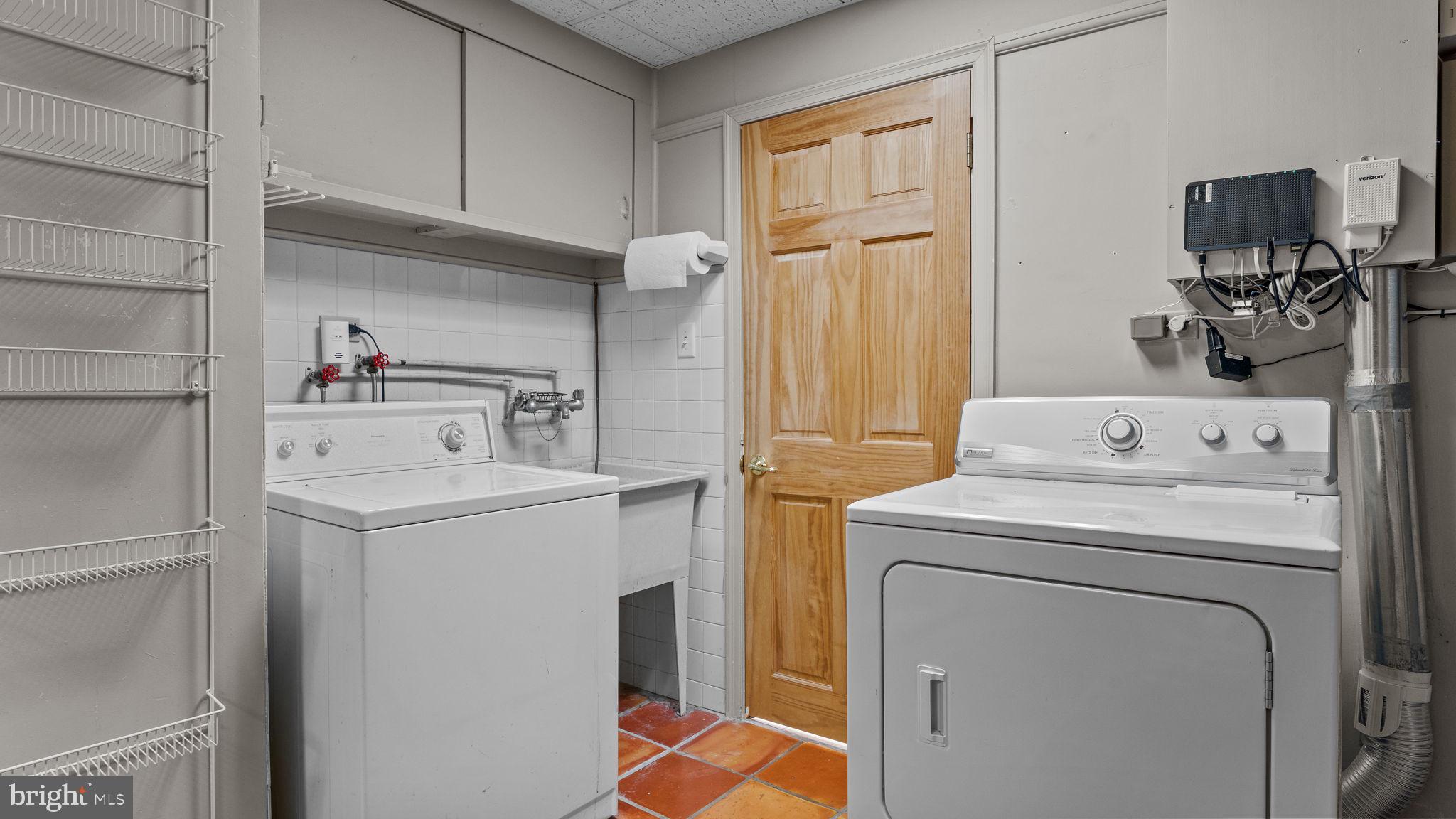 69 Crooked Billet Road Hatboro, PA 19040 - Photo 25 of 33 a utility room with dryer and washer