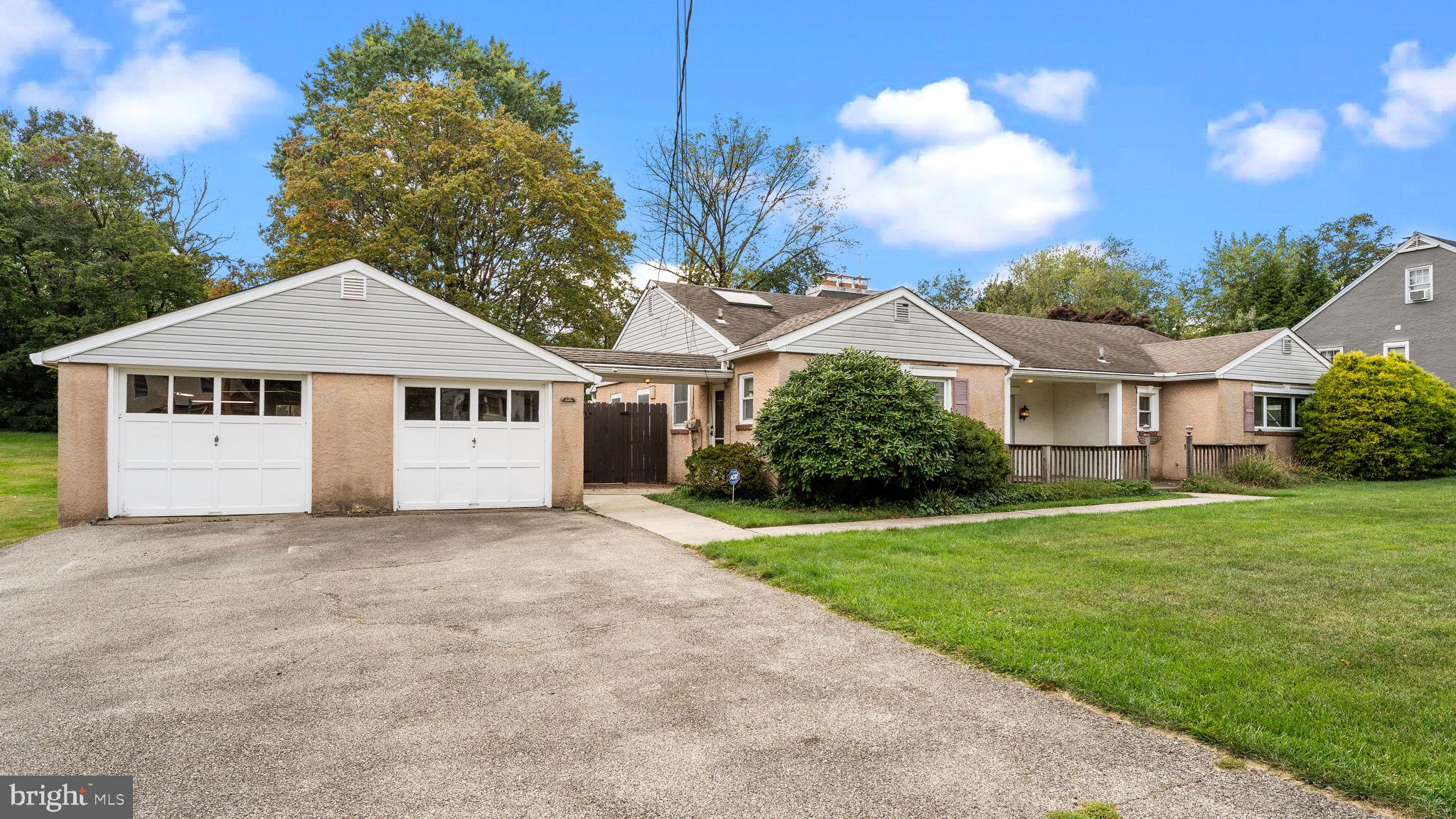 69 Crooked Billet Road Hatboro, PA 19040 - Photo 33 of 33 a front view of a house with a garden and yard