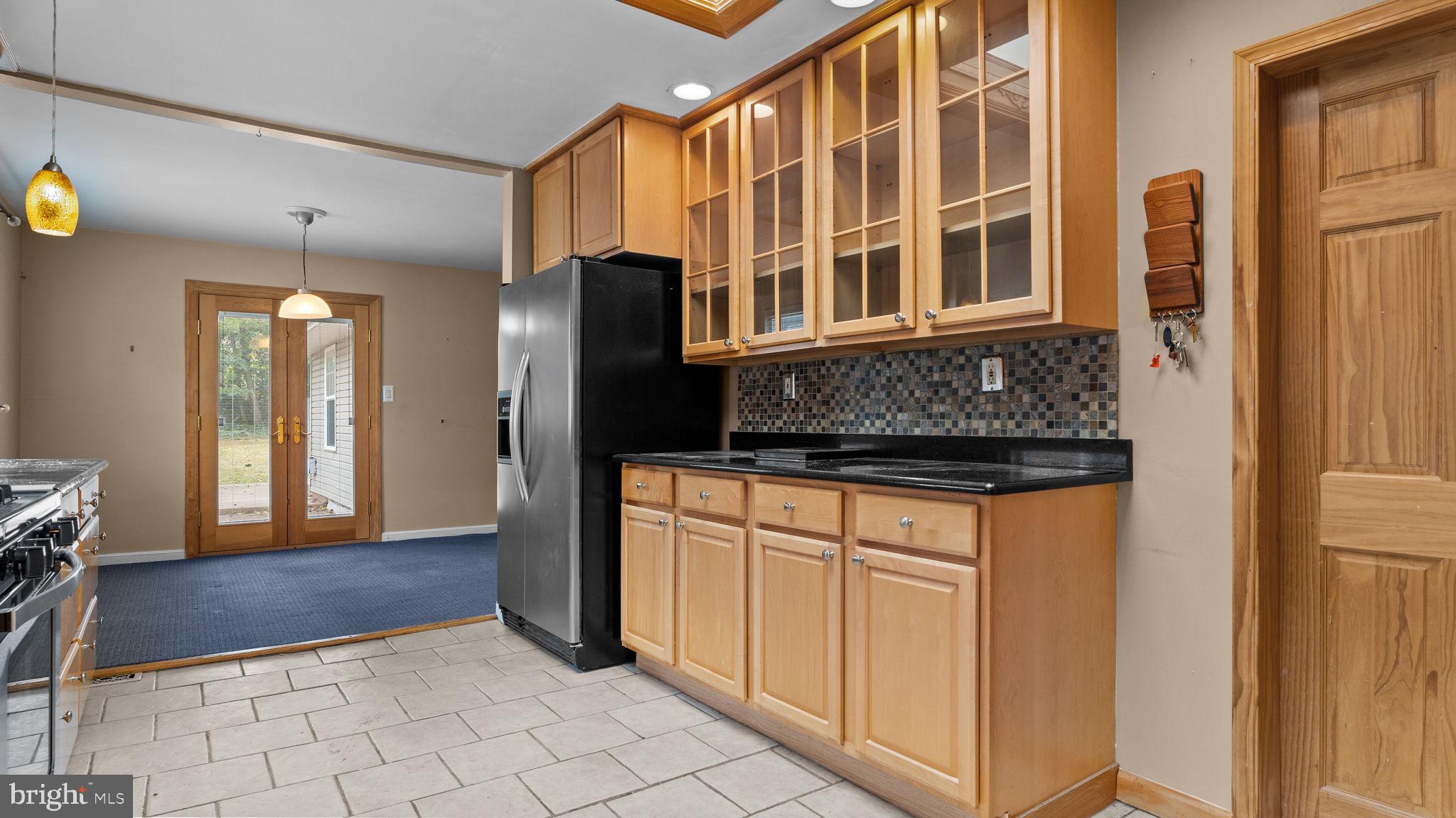 69 Crooked Billet Road Hatboro, PA 19040 - Photo 5 of 33 a kitchen with stainless steel appliances granite countertop a refrigerator and a stove